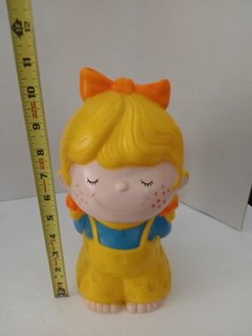 Russ Berrie Yellow and Blue Girl Bank with Orange Bow